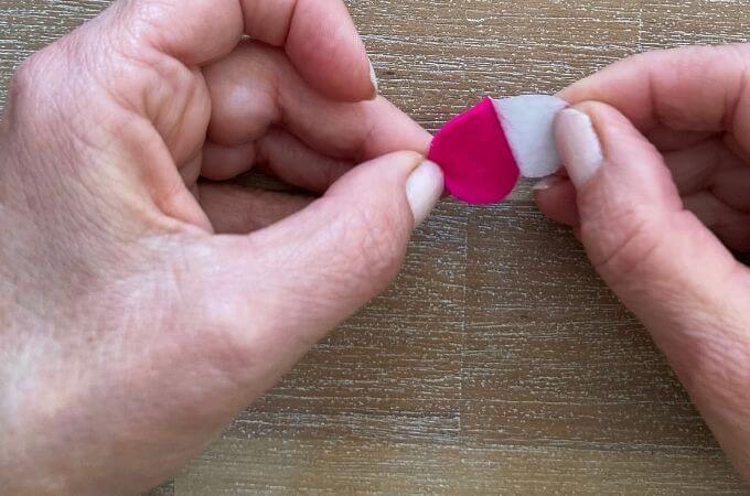 peeling freezer paper of a felt circle