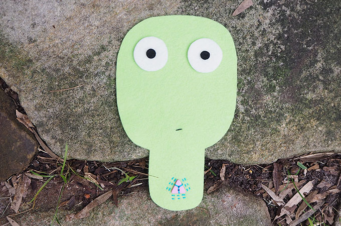 Sewing a button on your stuffie