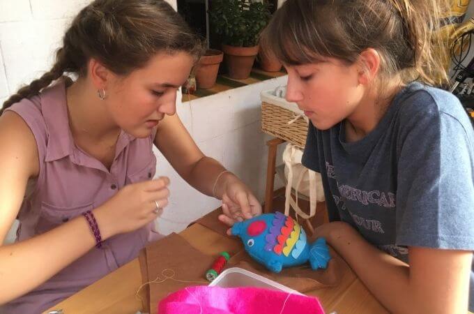 girls sewing a softie together