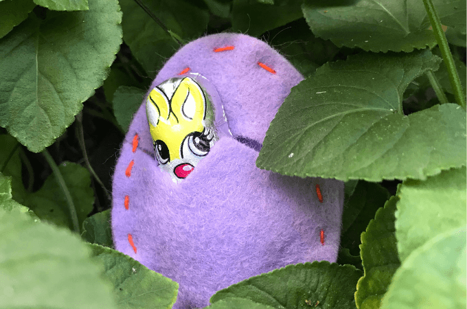 A fillable felt Easter egg with a chocolate bunny