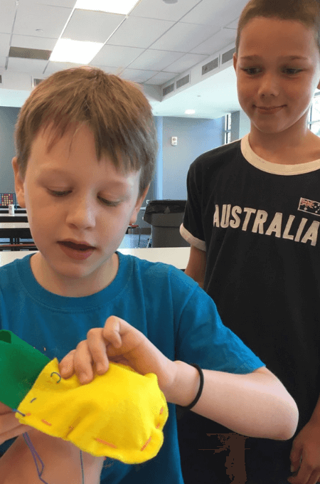 teaching a friend how to sew a softie